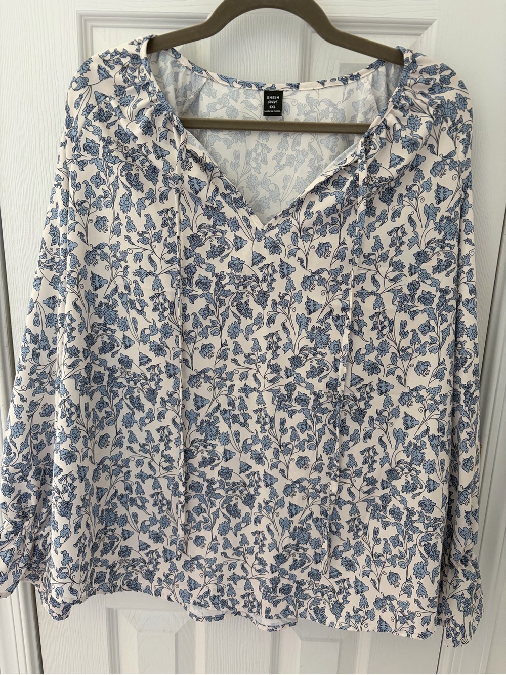 SHEIN White Blouse with Blue Floral Print and Tie Neck